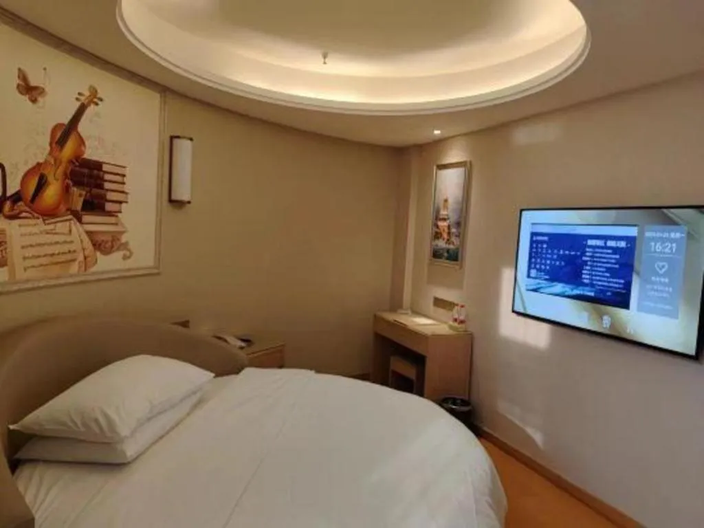 Bed in Vienna Hotel Zhengzhou Fengchan Road Fortune Plaza