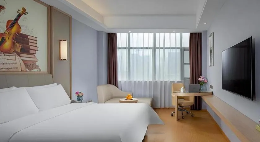 Bed in Vienna Hotel Zhengzhou Fengchan Road Fortune Plaza