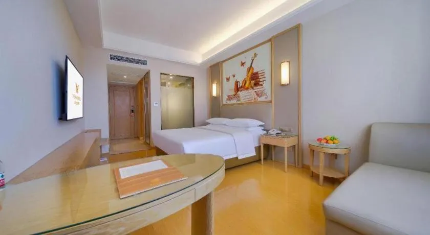 Bed in Vienna Hotel Zhengzhou Fengchan Road Fortune Plaza