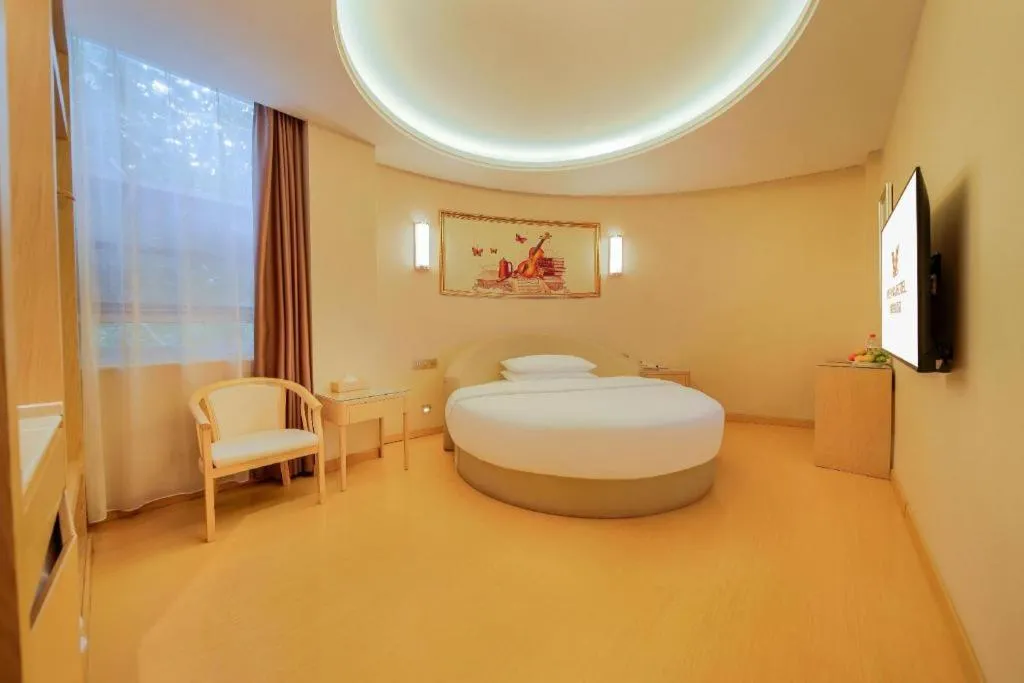 Bed in Vienna Hotel Zhengzhou Fengchan Road Fortune Plaza