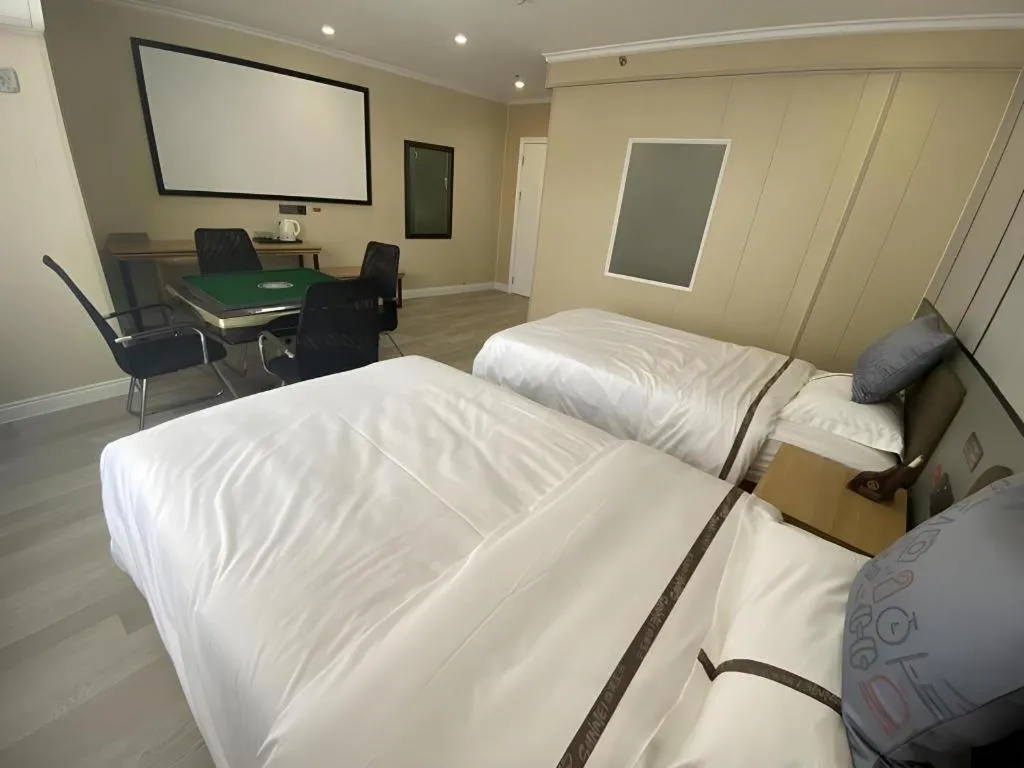 Bed in Jun Light Hotel Jiangxi Jiujiang Yongxiu County Dongyong Mall