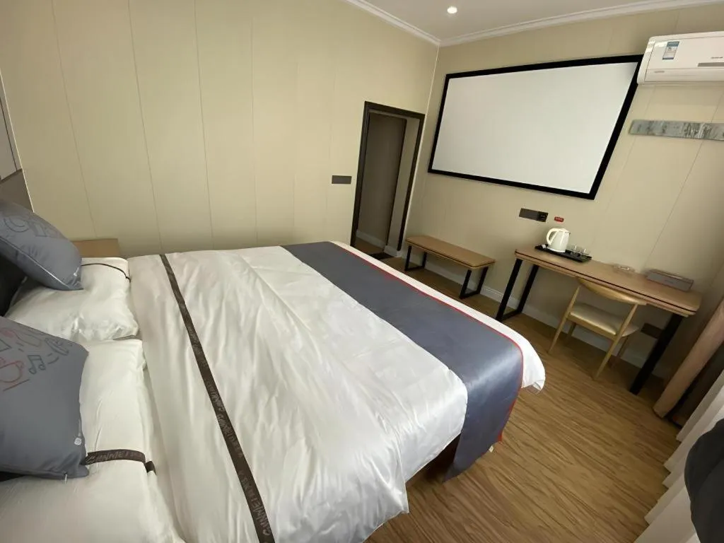 Bed in Jun Light Hotel Jiangxi Jiujiang Yongxiu County Dongyong Mall