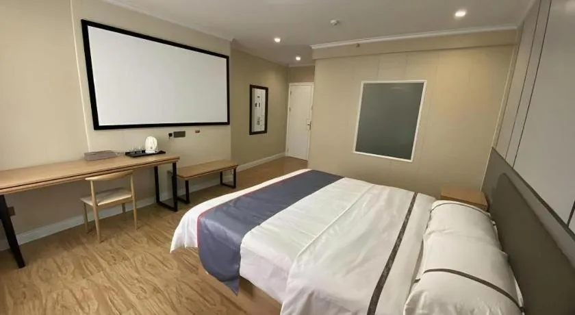 Bed in Jun Light Hotel Jiangxi Jiujiang Yongxiu County Dongyong Mall