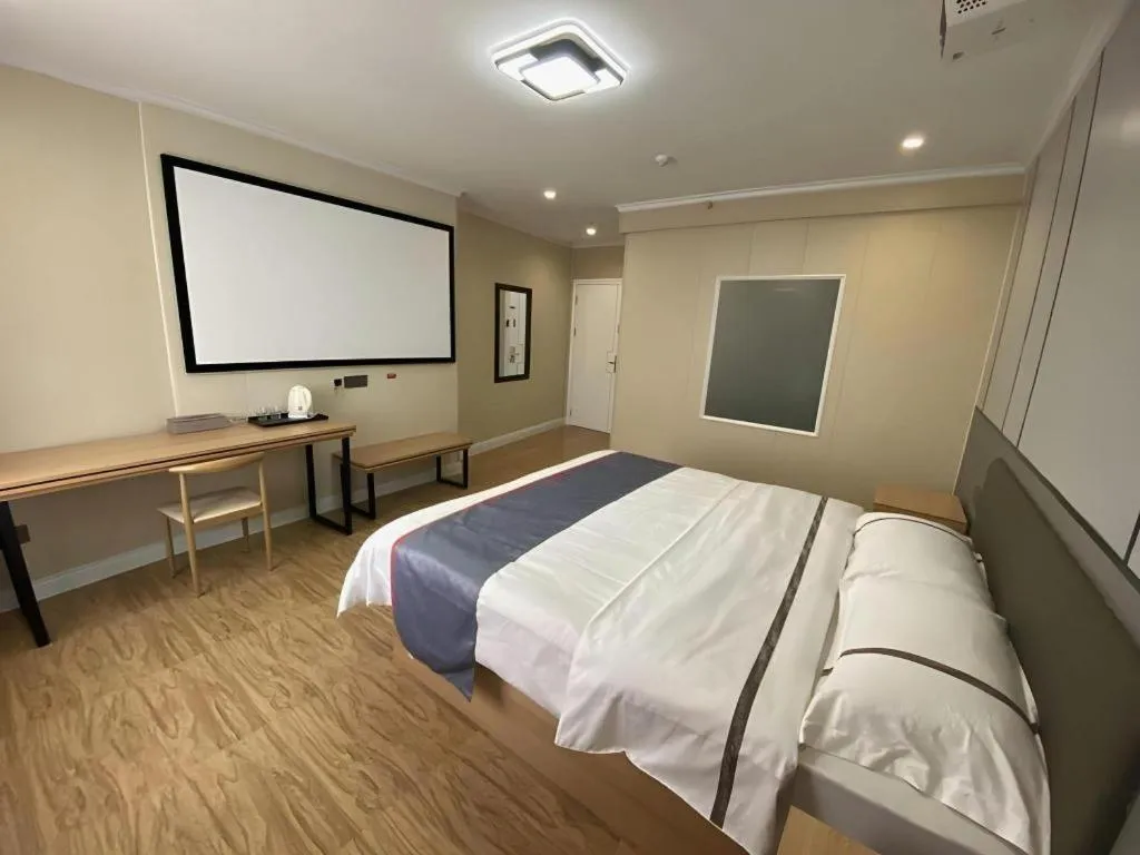 Bed in Jun Light Hotel Jiangxi Jiujiang Yongxiu County Dongyong Mall