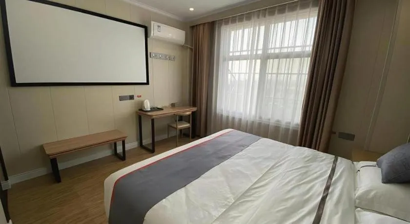 Bed in Jun Light Hotel Jiangxi Jiujiang Yongxiu County Dongyong Mall