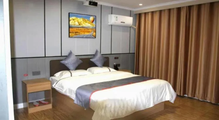 Bed in Jun Light Hotel Jiangxi Jiujiang Yongxiu County Dongyong Mall