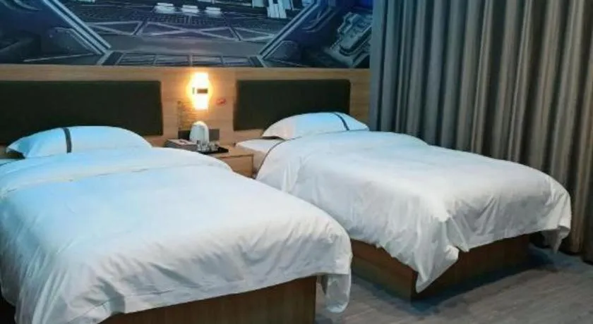 Bed in Jun Light Hotel Jiangxi Jiujiang Yongxiu County Dongyong Mall