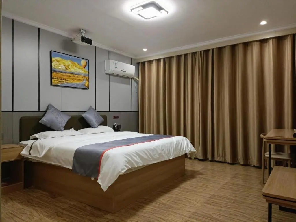 Bed in Jun Light Hotel Jiangxi Jiujiang Yongxiu County Dongyong Mall