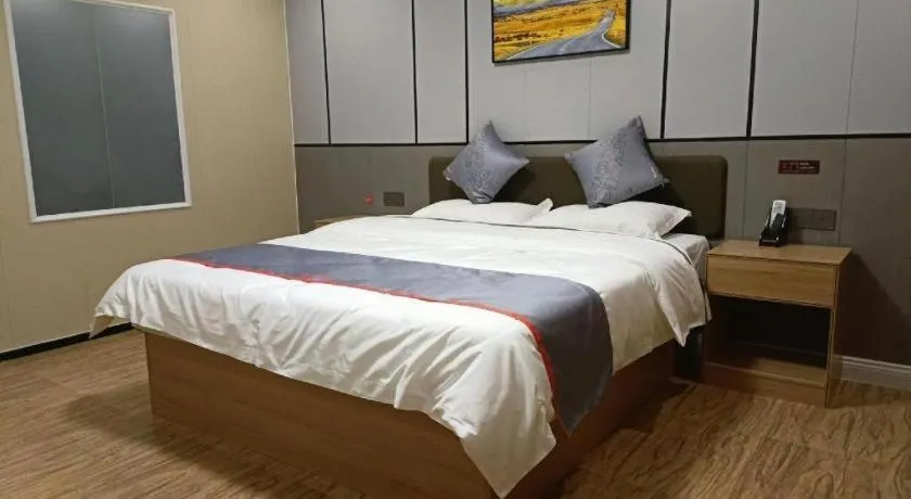 Bed in Jun Light Hotel Jiangxi Jiujiang Yongxiu County Dongyong Mall