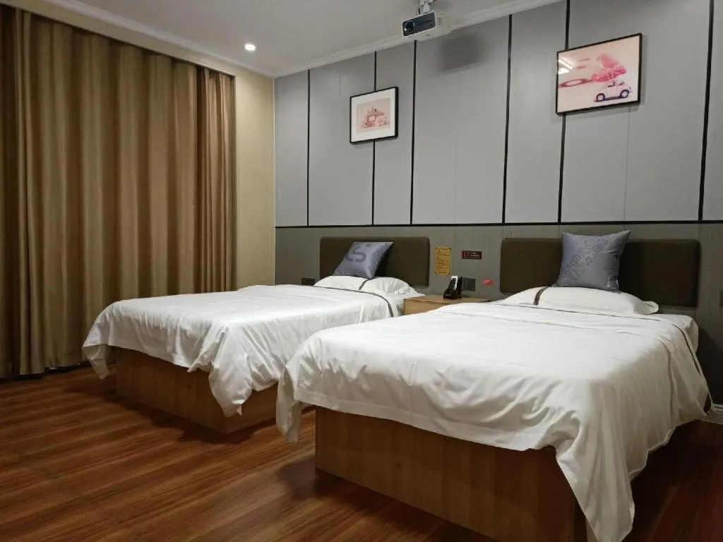 Bed in Jun Light Hotel Jiangxi Jiujiang Yongxiu County Dongyong Mall