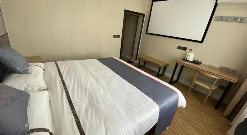 Bed in Jun Light Hotel Jiangxi Jiujiang Yongxiu County Dongyong Mall