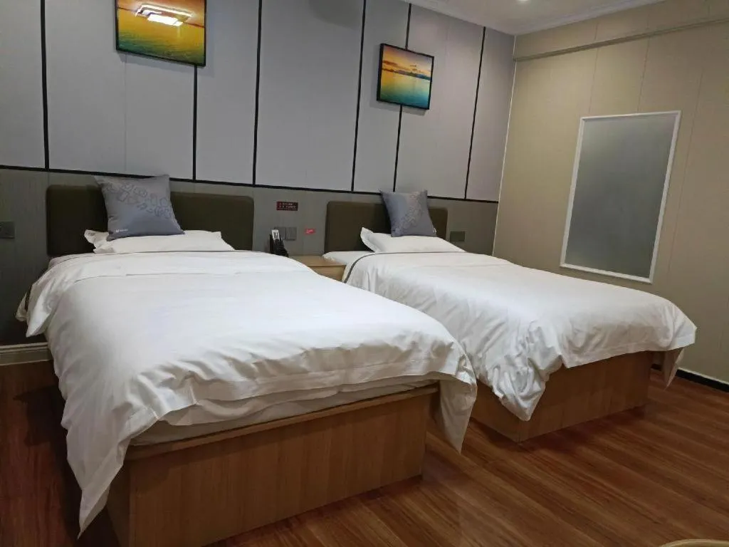 Bed in Jun Light Hotel Jiangxi Jiujiang Yongxiu County Dongyong Mall