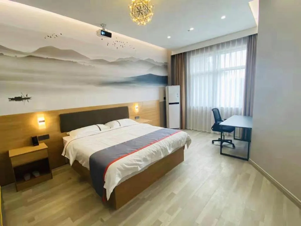 Bed in Jun Light Hotel Jiangxi Jiujiang Yongxiu County Dongyong Mall
