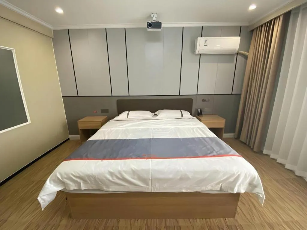 Bed in Jun Light Hotel Jiangxi Jiujiang Yongxiu County Dongyong Mall