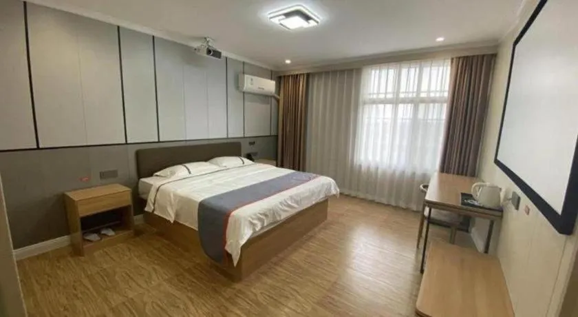 Bed in Jun Light Hotel Jiangxi Jiujiang Yongxiu County Dongyong Mall