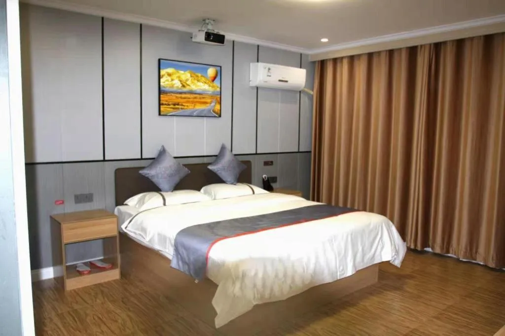 Bed in Jun Light Hotel Jiangxi Jiujiang Yongxiu County Dongyong Mall