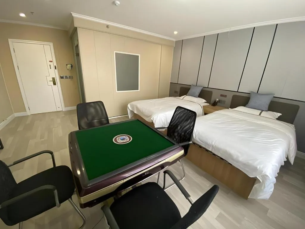 Bed in Jun Light Hotel Jiangxi Jiujiang Yongxiu County Dongyong Mall