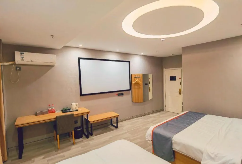 Bed in Jun Light Hotel Jiangxi Jiujiang Yongxiu County Dongyong Mall