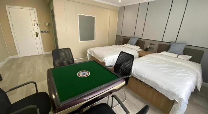 Bed in Jun Light Hotel Jiangxi Jiujiang Yongxiu County Dongyong Mall