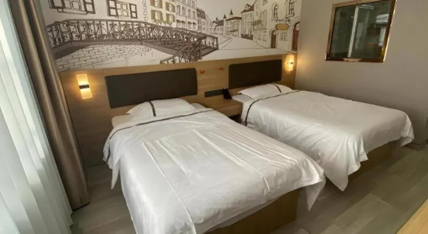 Bed in Jun Light Hotel Jiangxi Jiujiang Yongxiu County Dongyong Mall