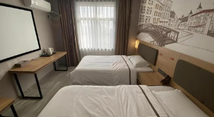 Bed in Jun Light Hotel Jiangxi Jiujiang Yongxiu County Dongyong Mall