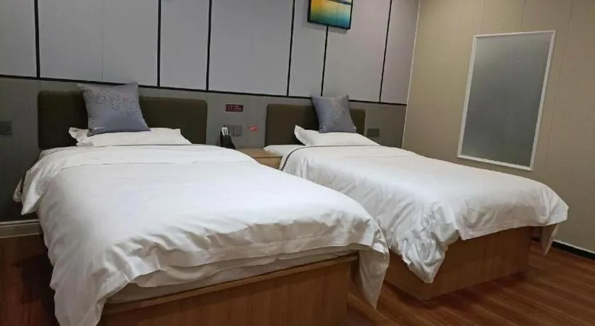 Bed in Jun Light Hotel Jiangxi Jiujiang Yongxiu County Dongyong Mall