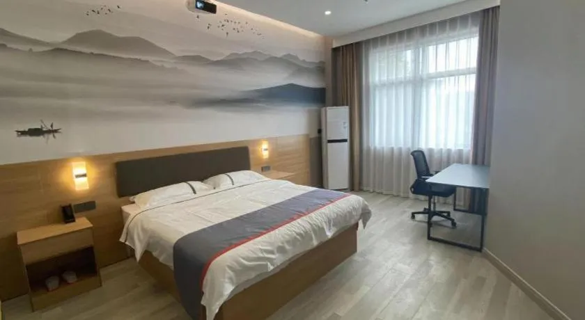 Bed in Jun Light Hotel Jiangxi Jiujiang Yongxiu County Dongyong Mall