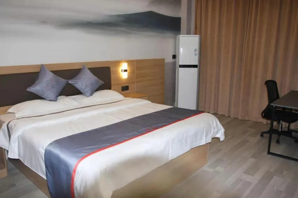 Bed in Jun Light Hotel Jiangxi Jiujiang Yongxiu County Dongyong Mall