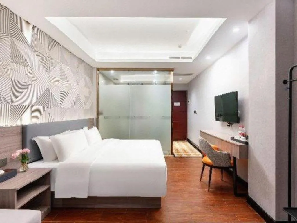 Bed in Borrman Hotel Huizhou Danshui High-speed Railway Huiyang Station