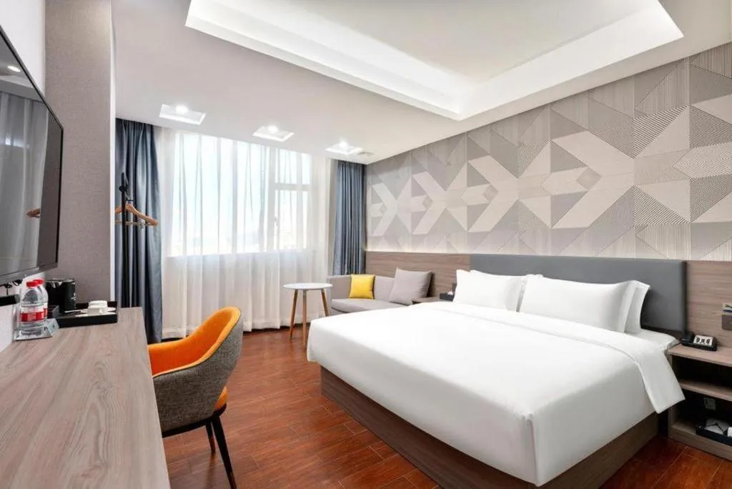 Bed in Borrman Hotel Huizhou Danshui High-speed Railway Huiyang Station