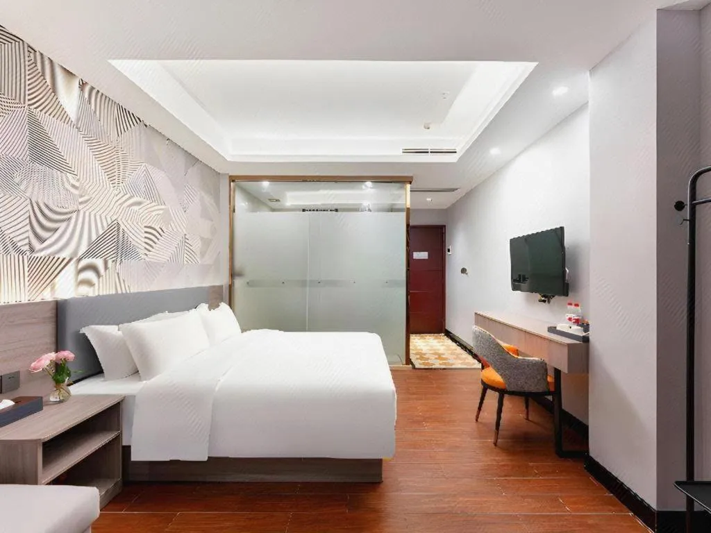 Bed in Borrman Hotel Huizhou Danshui High-speed Railway Huiyang Station