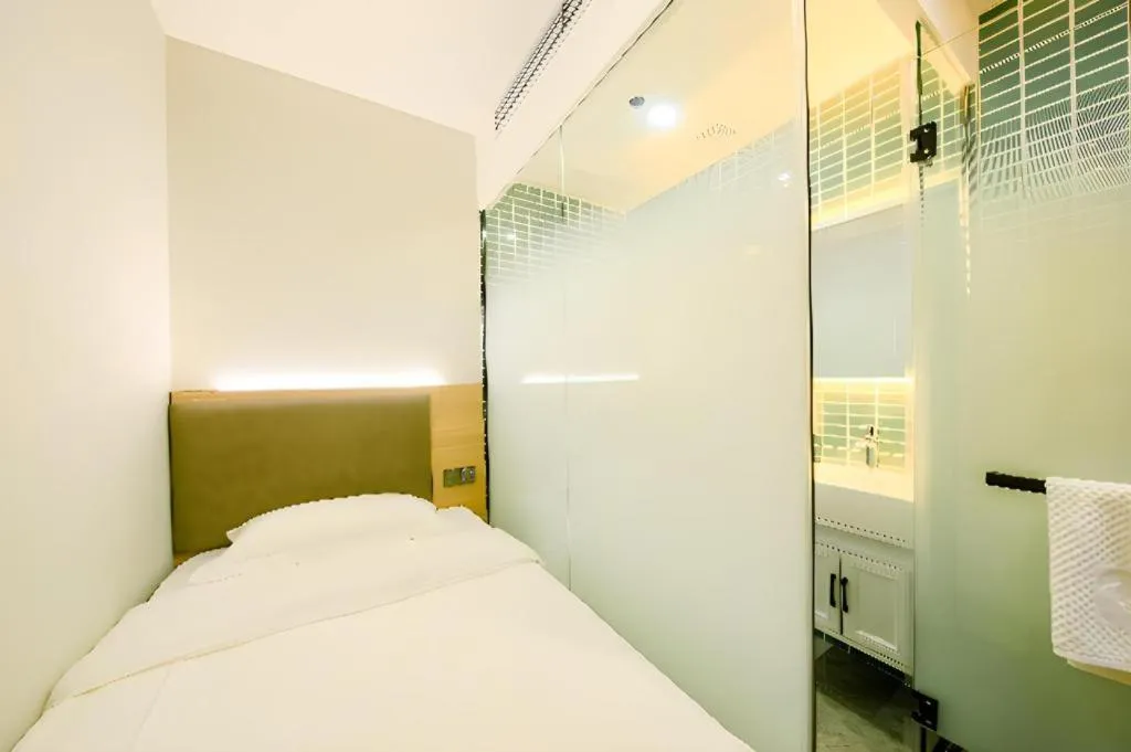 Bed in Borrman Hotel South Beijing Railway Station Caoqiao Station