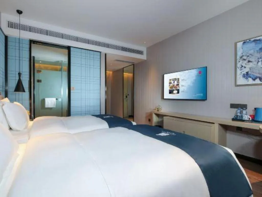 Bed in Echarm Hotel Chengdu Global Center Century City New Exhibition