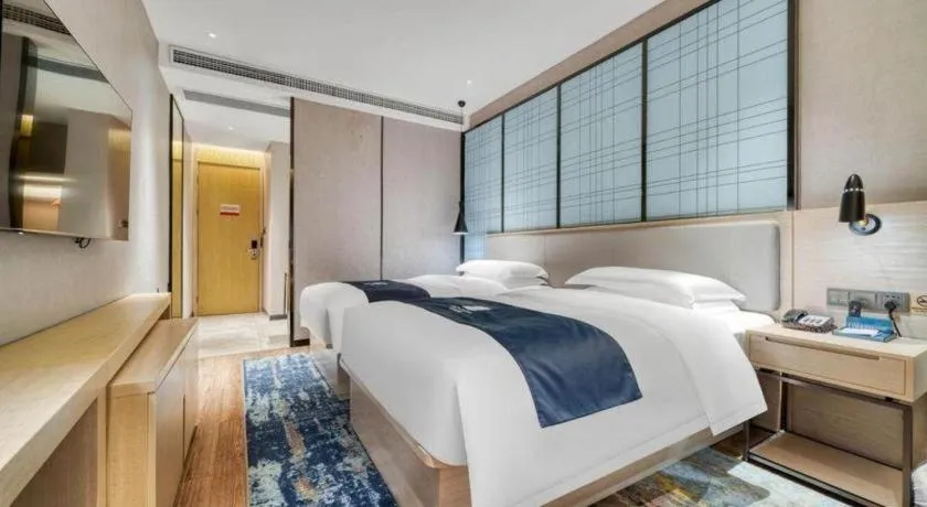Bed in Echarm Hotel Chengdu Global Center Century City New Exhibition