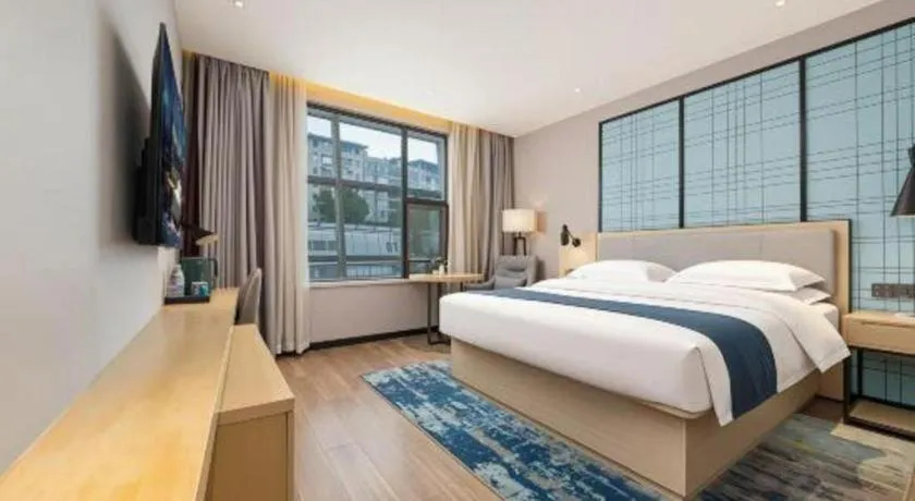 Bed in Echarm Hotel Chengdu Global Center Century City New Exhibition