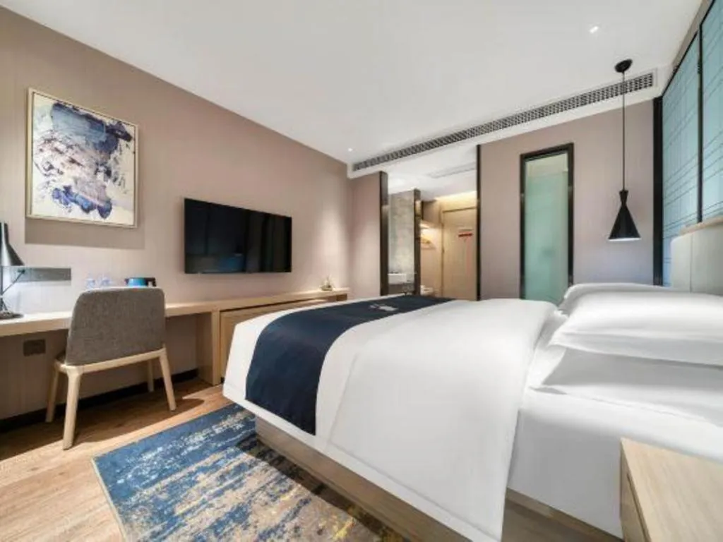 Bed in Echarm Hotel Chengdu Global Center Century City New Exhibition