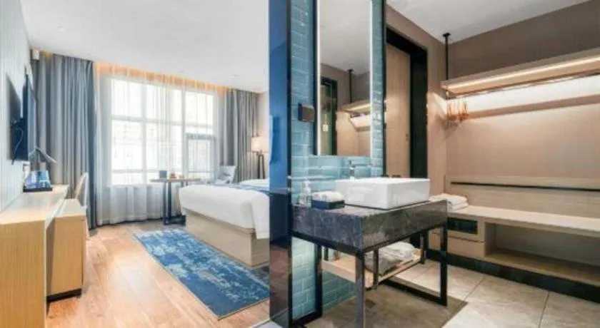 Bed in Echarm Hotel Chengdu Global Center Century City New Exhibition