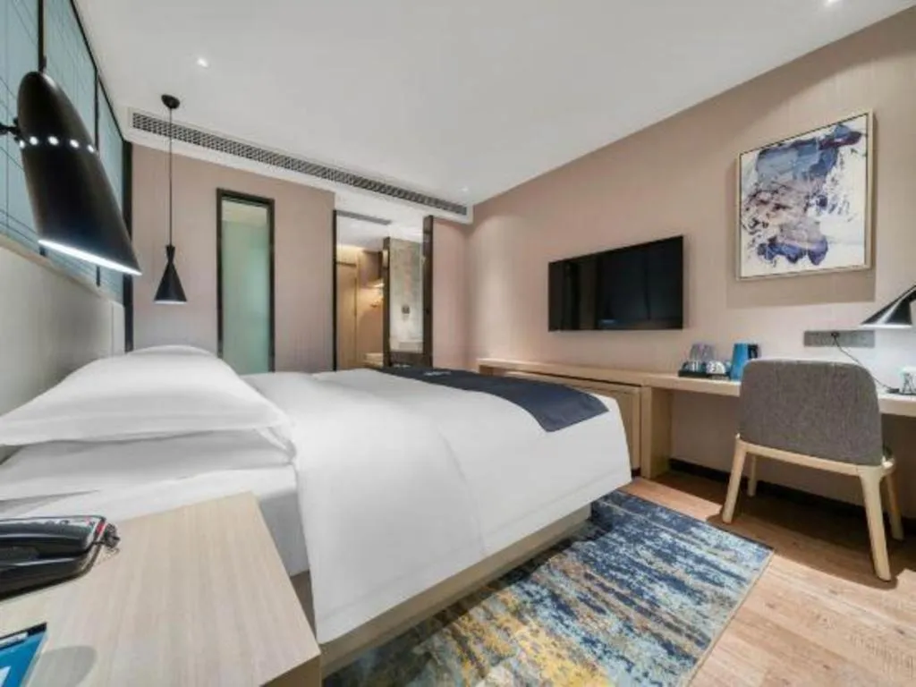 Bed in Echarm Hotel Chengdu Global Center Century City New Exhibition