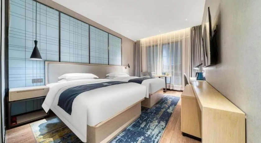 Bed in Echarm Hotel Chengdu Global Center Century City New Exhibition