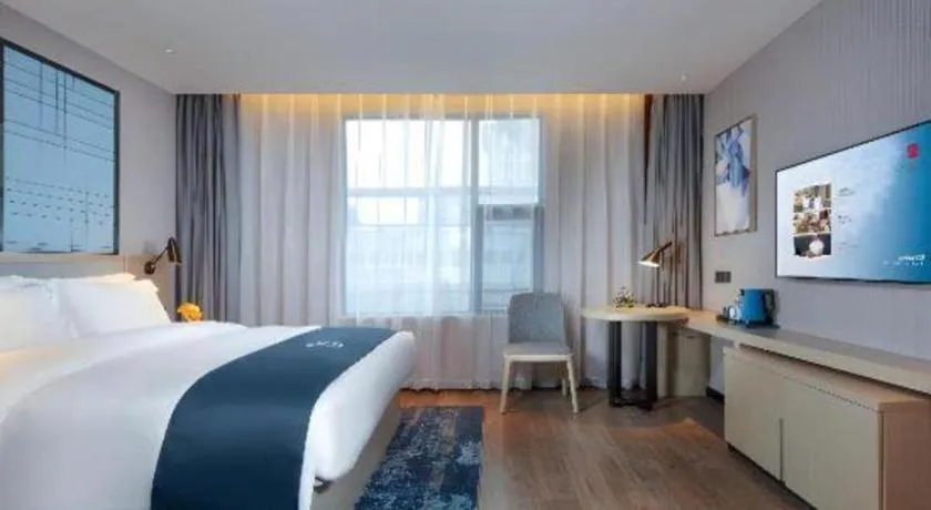Bed in Echarm Hotel Chengdu Global Center Century City New Exhibition
