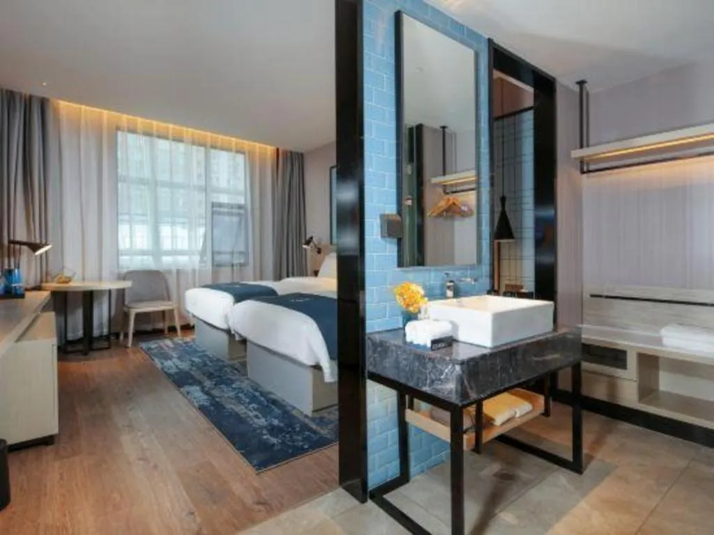 Bed in Echarm Hotel Chengdu Global Center Century City New Exhibition