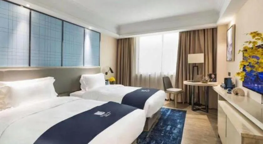 Bed in Echarm Hotel Chengdu Global Center Century City New Exhibition