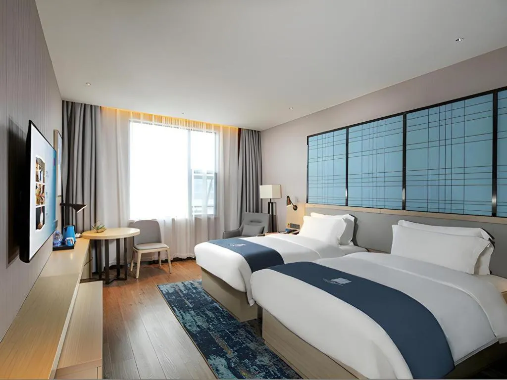 Bed in Echarm Hotel Chengdu Global Center Century City New Exhibition