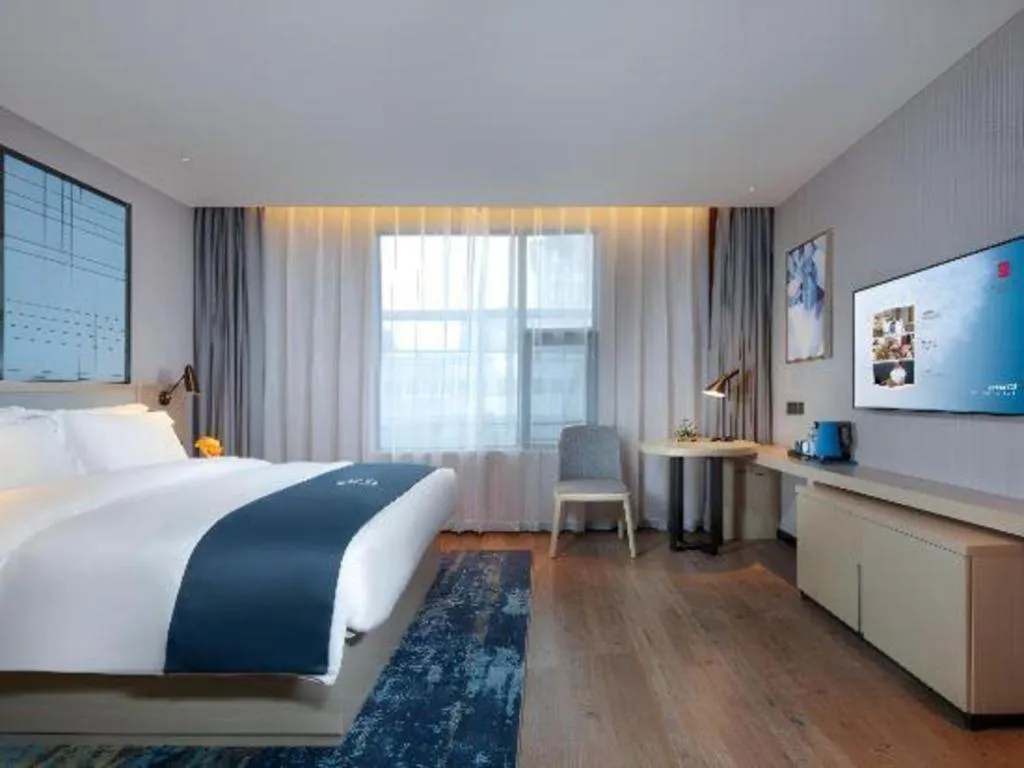 Bed in Echarm Hotel Chengdu Global Center Century City New Exhibition