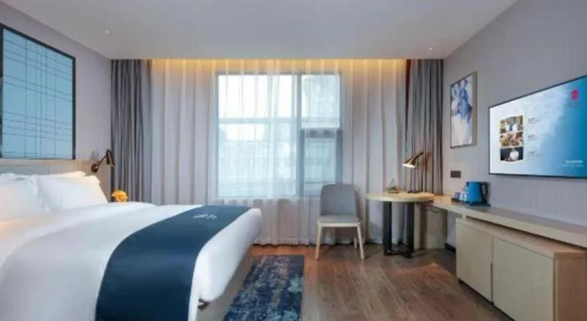 Bed in Echarm Hotel Chengdu Global Center Century City New Exhibition