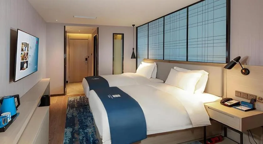 Bed in Echarm Hotel Chengdu Global Center Century City New Exhibition