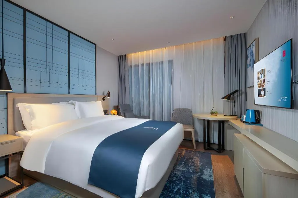 Bed in Echarm Hotel Chengdu Global Center Century City New Exhibition