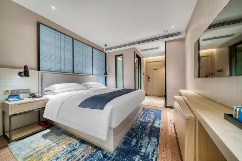 Bed in Echarm Hotel Chengdu Global Center Century City New Exhibition