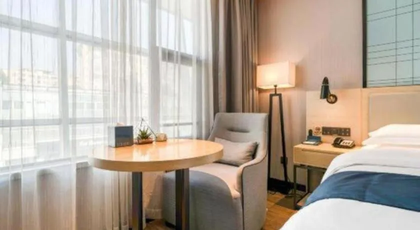 Bed in Echarm Hotel Chengdu Global Center Century City New Exhibition