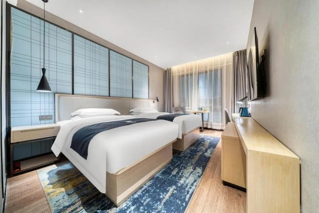Bed in Echarm Hotel Chengdu Global Center Century City New Exhibition
